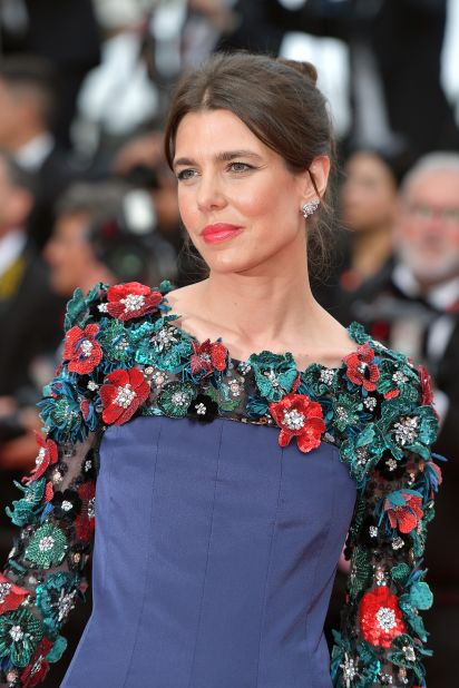 Charlotte Casiraghi, granddaughter of Princess Grace Kelly of Monaco, looked regal in a navy Chanel couture dress complete with a floral appliqué detailing.
