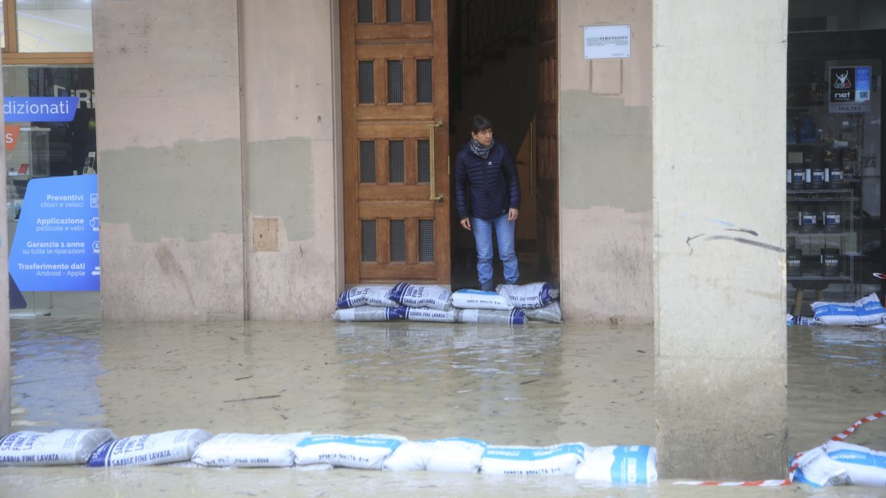 Sandbags were lined up along a flooded street in Bologna, Italy, on Tuesday.
