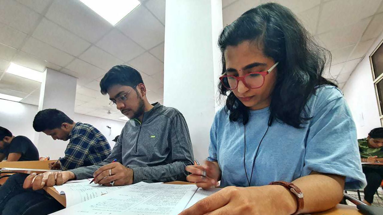 Sarang Agrawal (center) is studying in the hope of becoming a civil servant.