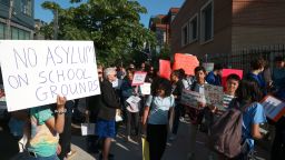 May 16, 2023 - Students and parents from Public School MS 577 walk march around the school located at N 5th Street and Roebling Streets protesting Migrants being housed at the School gymnasium. The Migrants placed at the Gymnasium were removed around 2:00AM to unknown location in Staten Island after the City got wind of the planned protest.