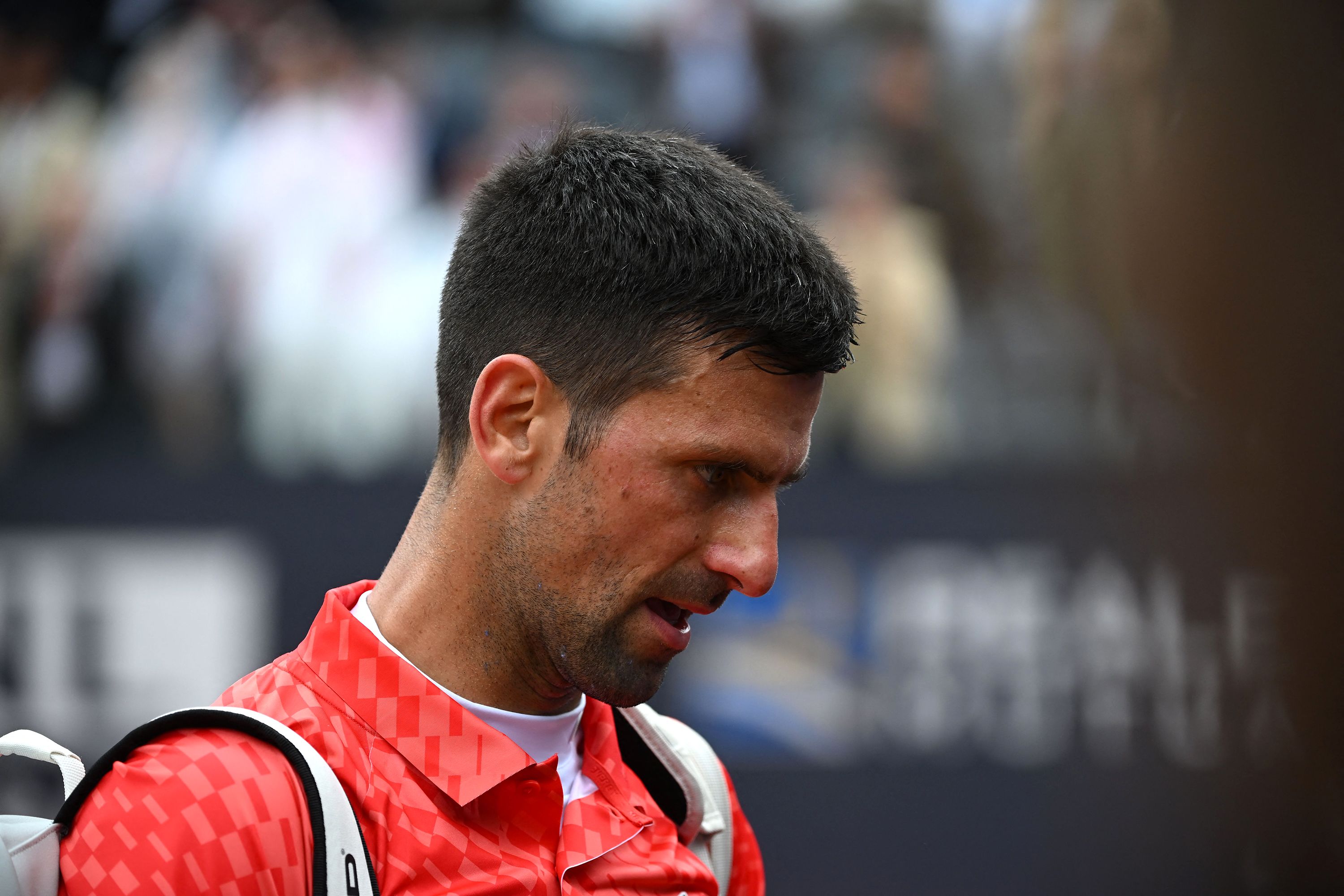 Serbia's Novak Djokovic shouts during the quarter final match against  Denmark's Holger Rune at the Italian Open tennis tournament, in Rome,  Wednesday, May 17, 2023. (AP Photo/Gregorio Borgia Stock Photo - Alamy