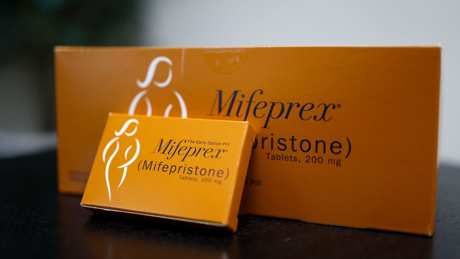 Packages of Mifepristone tablets are displayed.