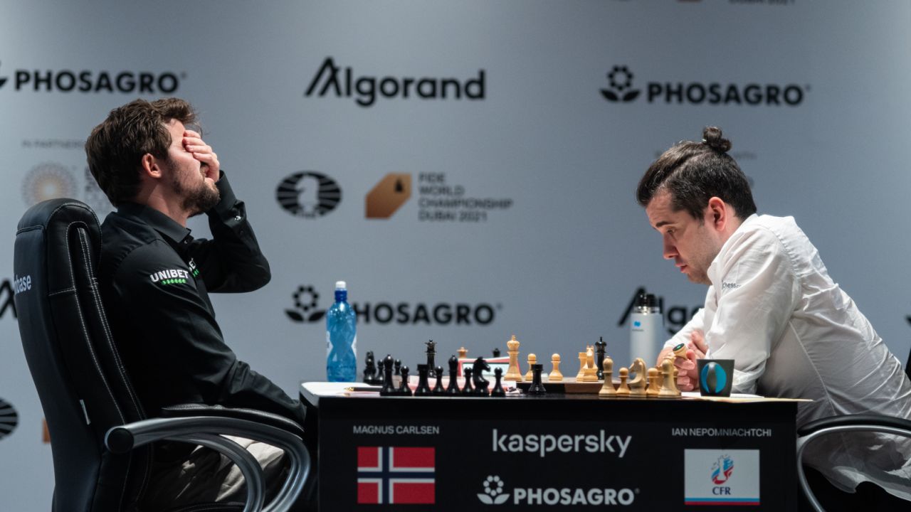 Magnus Carlsen reacts with relief when he realizes he will beat Ian Nepomniachtchi after over seven-and-a-half hours of intense play in game six of the 2022 World Championships. 