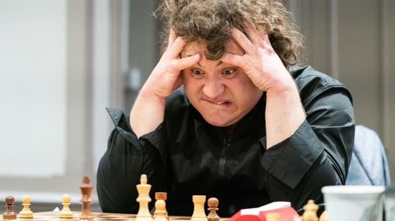And this is my all-time favorite. GM Anton Korobov grinning over his position at the Isle of Man Grand Swiss. Many thought this was staged and I can't blame them, but I assure you if chess players were looking around every time someone with a telephoto lens would be aiming at them from under the table across the playing hall, they would've lost on time! This is taken with a Sony 70-200 on a 200mm setting, which means I was probably about 20 meters away. It definitely helps to be a chess player myself as I wasn't even planning to take his photo that day but just had a glance at the position and thought - something might happen.