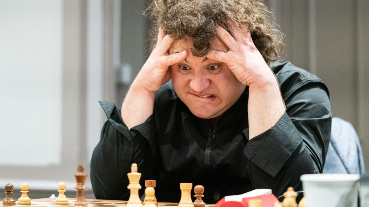 Grandmaster Anton Korobov grimaces over his position at the Isle of Man Grand Swiss.