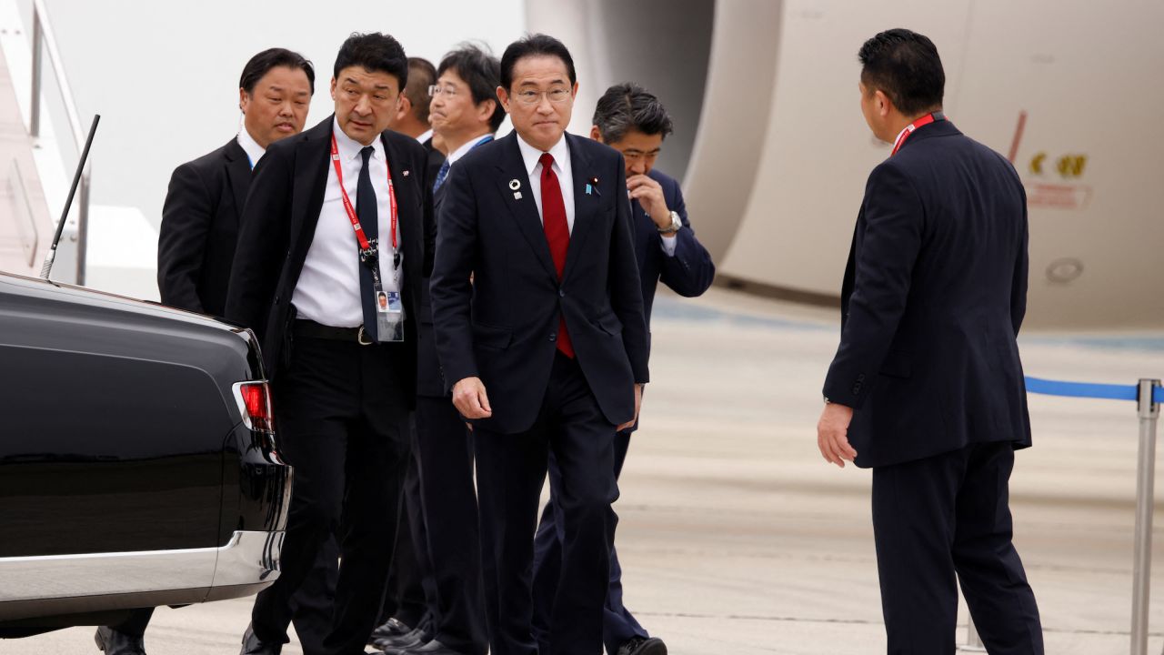Japanese Prime Minister Fumio Kishida arrives at Hiroshima airport to attend the G7 leaders' summit in Hiroshima, Japan, on Thursday.