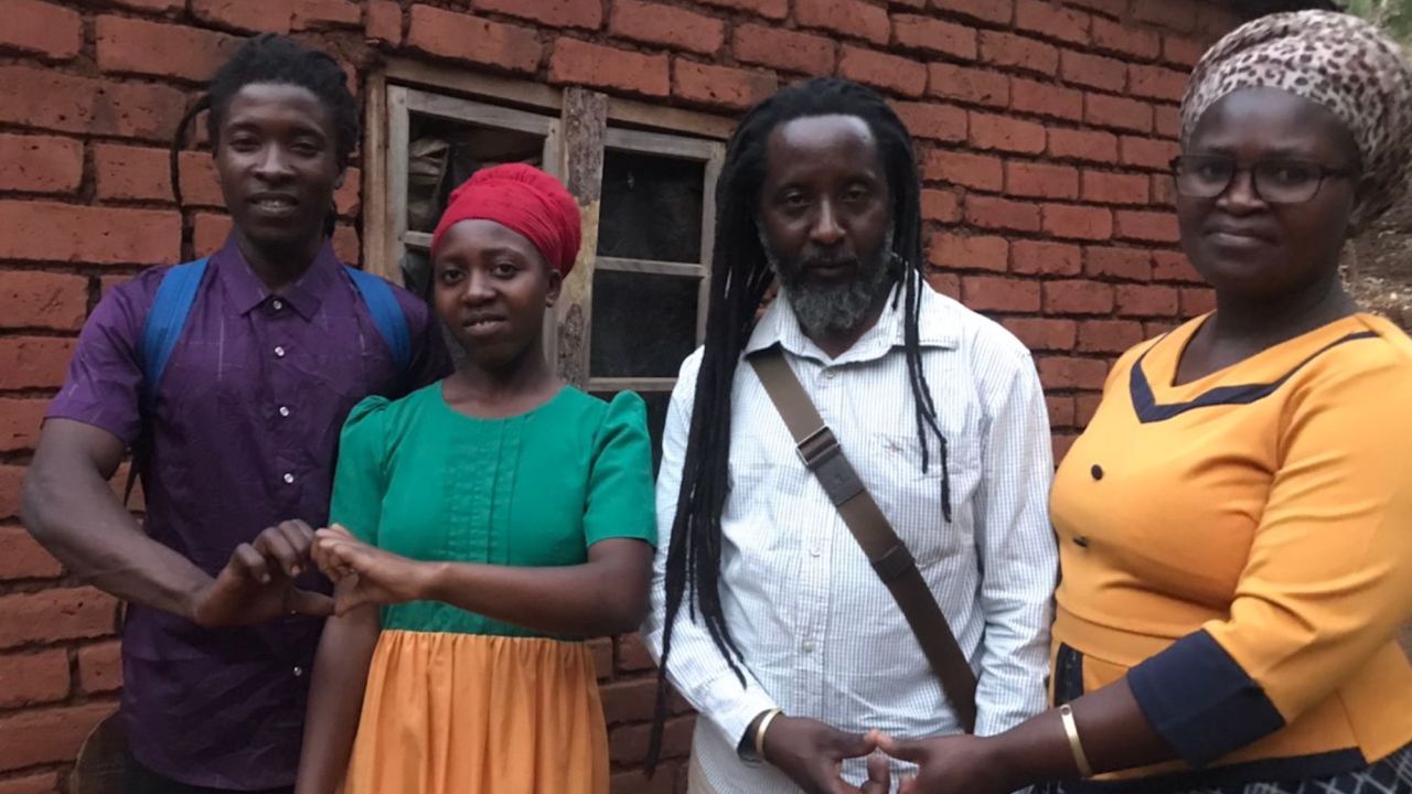 Alli Nansolo pictured center with wife Empress and their children, including Ishmael, who was denied admission to school in Malawi because of his dreadlocks.
