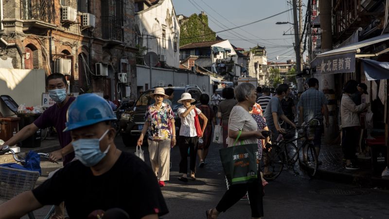NextImg:Xi Jinping says no to 'street stall economy' in Beijing | CNN Business