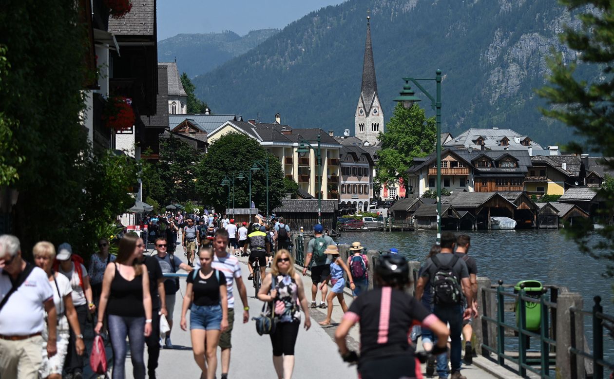 <strong>Tourist catnip:</strong> The pandemic gave the village of fewer than 800 residents a break from tourists -- it was attracting a reported million visitors a year pre-Covid. But by 2021, pictured, they were back in force. <br />