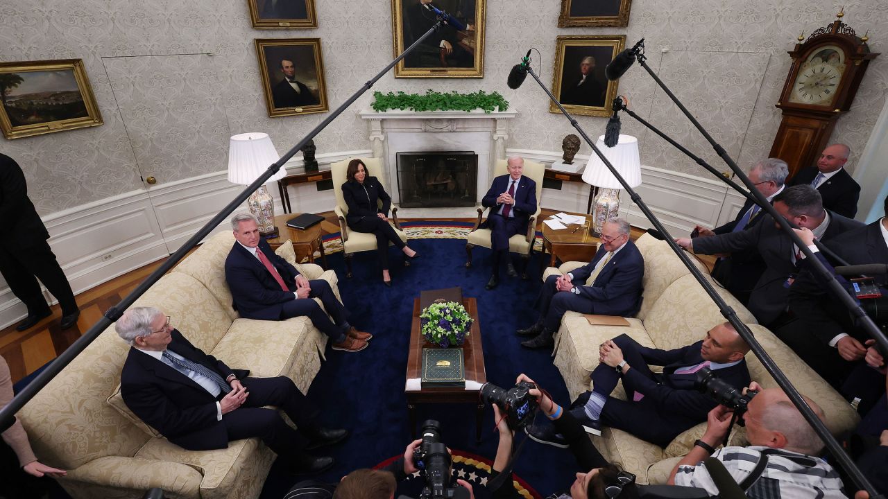 President Joe Biden and Vice President Kamala Harris host Congressional leaders, including Senate Minority Leader Mitch McConnell, Speaker of the House Kevin McCarthy, Senate Majority Leader Charles Schumer and House Minority Leader Hakeem Jeffries for a meeting about raising the debt limit in the Oval Office at the White House on May 16 in Washington, DC. 