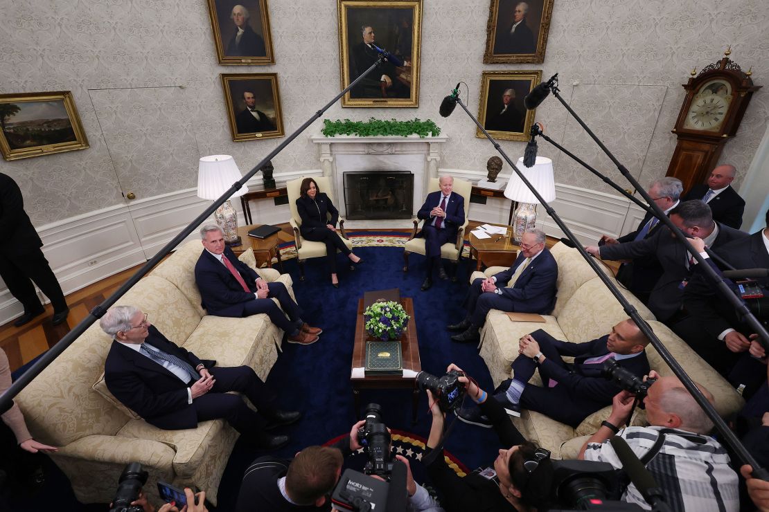 President Joe Biden and Vice President Kamala Harris host Congressional leaders, including Senate Minority Leader Mitch McConnell, Speaker of the House Kevin McCarthy, Senate Majority Leader Charles Schumer and House Minority Leader Hakeem Jeffries for a meeting about raising the debt limit in the Oval Office at the White House on May 16 in Washington, DC. 