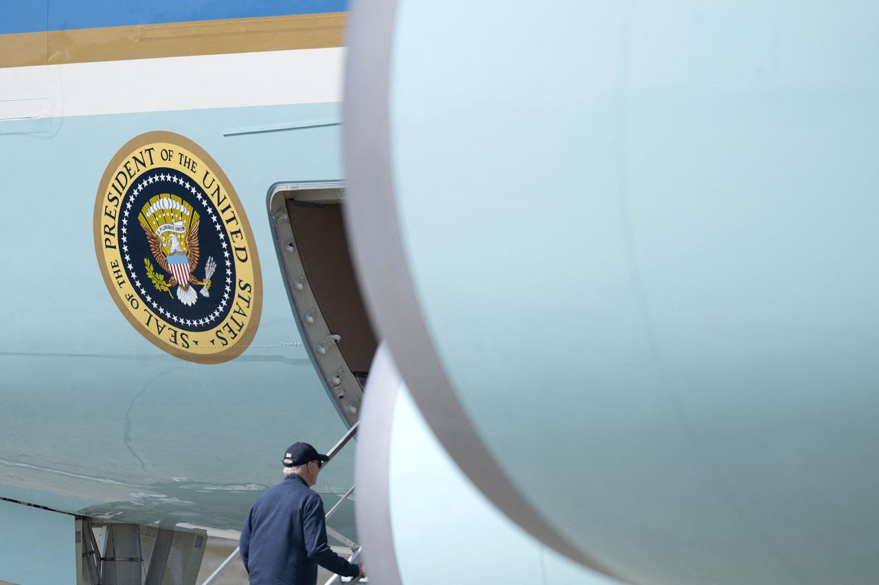 Biden boards Air Force One during after a stop for refueling at Elmendorf Air Force Base in Anchorage, Alaska, on May 17. 