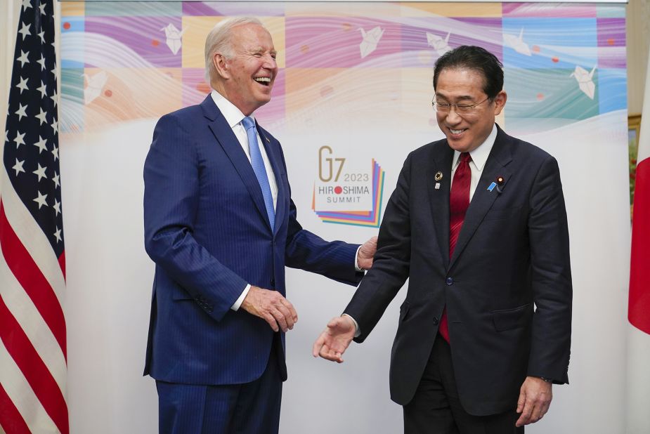 Biden and Kishida laugh together in Hiroshima on May 18.
