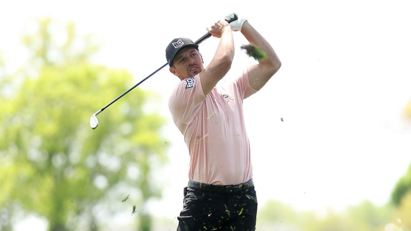 NextImg:Bryson DeChambeau's wayward shot hits PGA Professional about to tee off on another hole at PGA Championship | CNN