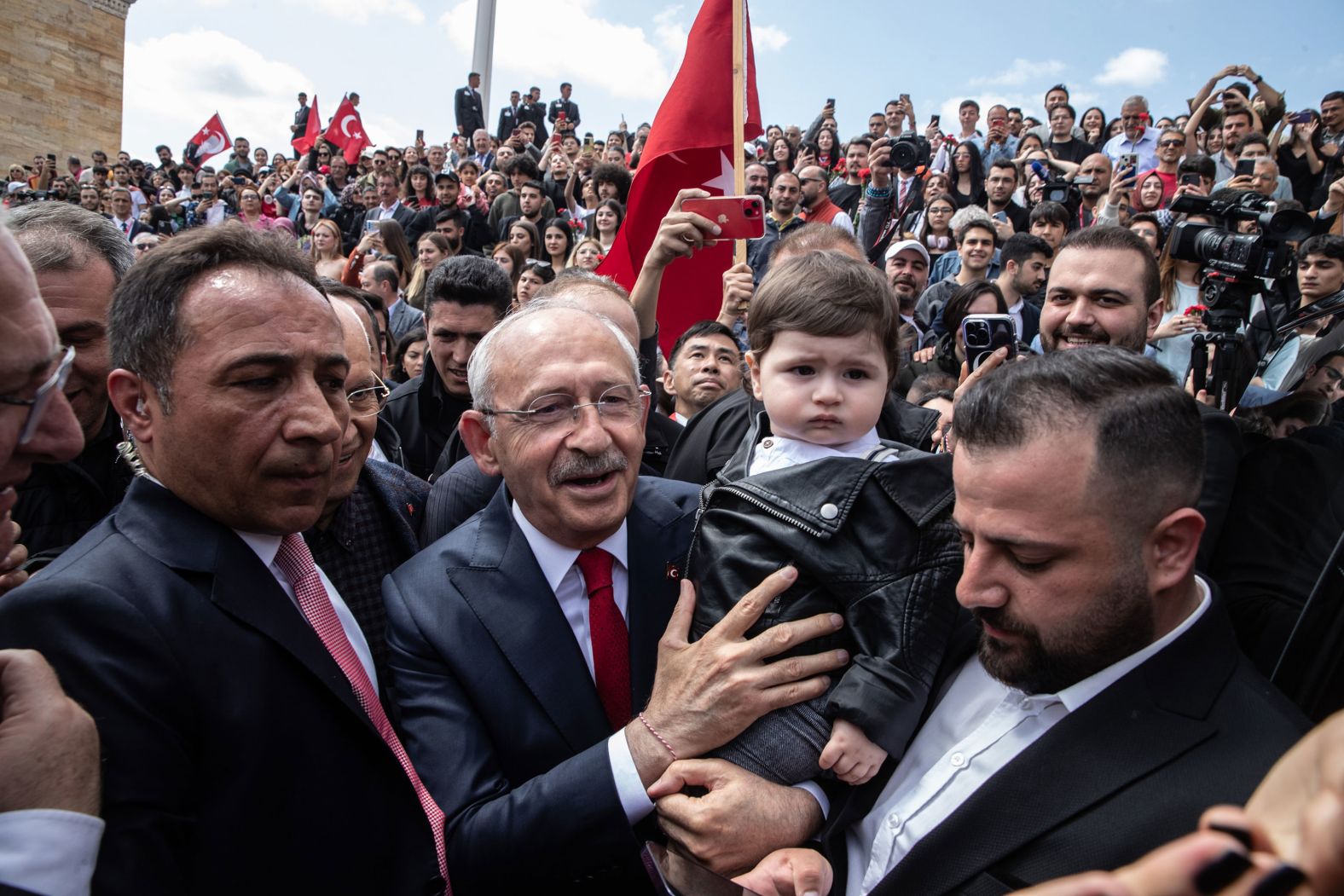 Turkish presidential candidate Kemal Kilicdaroglu, center, meets with supporters in the country's capital of Ankara as he visits Anitkabir, the mausoleum of the founder of modern Turkey, on Saturday, May 13. Turkey's fiercely contested presidential election is <a href="index.php?page=&url=https%3A%2F%2Fwww.cnn.com%2F2023%2F05%2F15%2Feurope%2Fturkey-runoff-elections-erdogan-kilicdaroglu-intl%2Findex.html" target="_blank">heading to a runoff</a> after neither Kilicdaroglu nor <a href="index.php?page=&url=https%3A%2F%2Fwww.cnn.com%2F2023%2F05%2F12%2Fmiddleeast%2Fgallery%2Frecep-tayyip-erdogan%2Findex.html" target="_blank">President Recep Tayyip Erdogan</a> was able to secure 50% of the vote.
