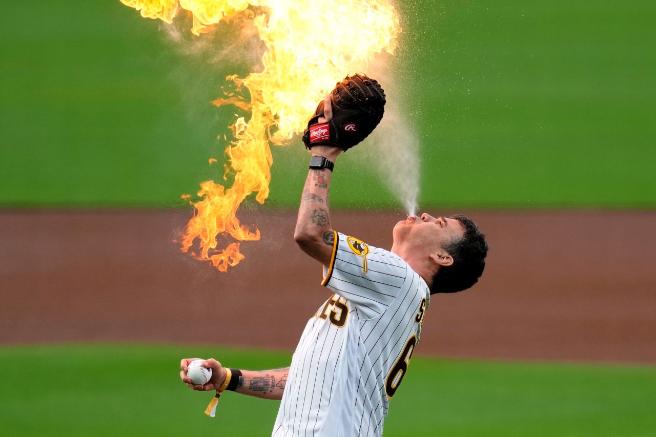 Entertainer Steve-O, best known for his appearances in the "Jackass" movie series, spits fire while throwing the ceremonial first pitch at a Major League Baseball game in San Diego on Monday, May 15.