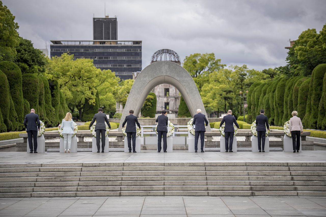 Michel, Meloni, Trudeau, Macron, Kishida, Biden, Scholz, and von der Leyen lay down wreaths during a ceremony at Peace Park in Hiroshima on May 19.