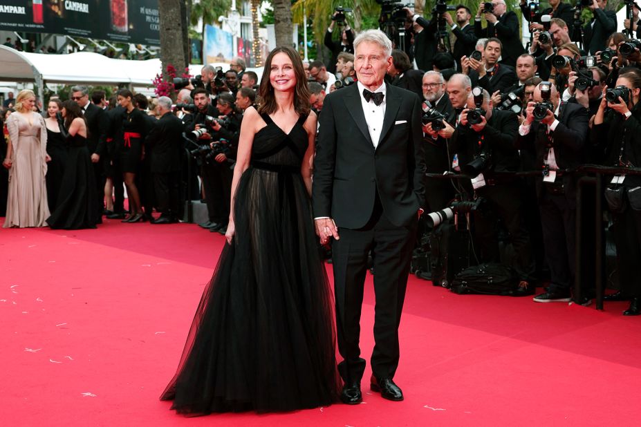 On May 18, Harrison Ford received an honorary Palme d'Or at the premiere of the fifth Indiana Jones film. He arrived in a sharp tuxedo and bow tie alongside his wife, Calista Flockhart, who wore a classic Zuhair Murad gown.