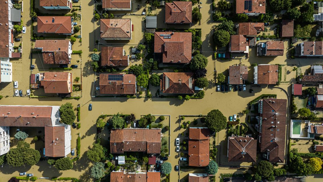 The town of Lugo, pictured on Thursday, was left under water following floods that left at least 14 people dead.