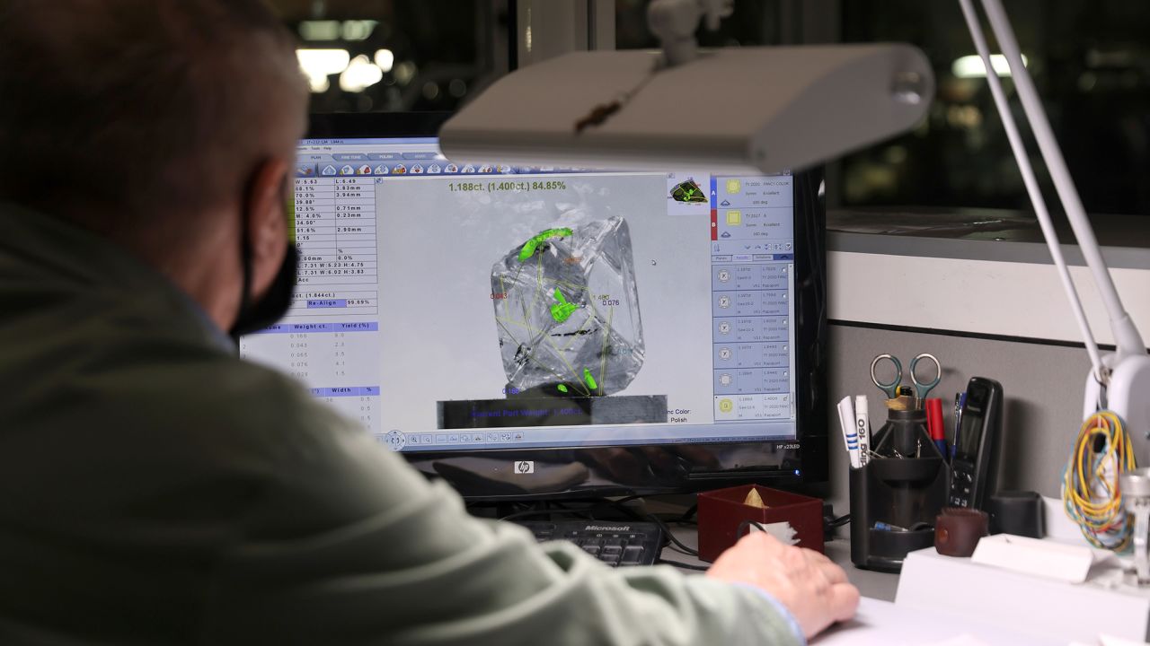A 3D-model of a rough diamond is seen on a screen at the "Diamonds of Alrosa" factory in Moscow, Russia, in April 2021.