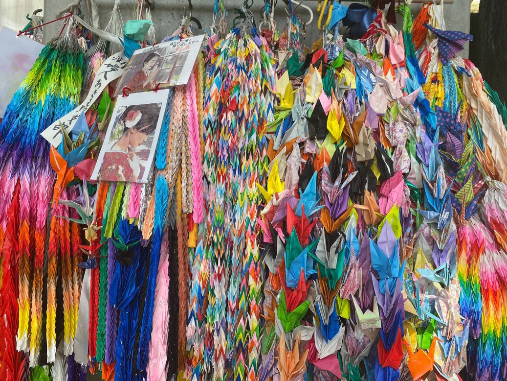 <strong>Symbols of peace: </strong>Paper cranes symbolizing peace adorn a memorial inside the Hiroshima Peace Memorial Park.