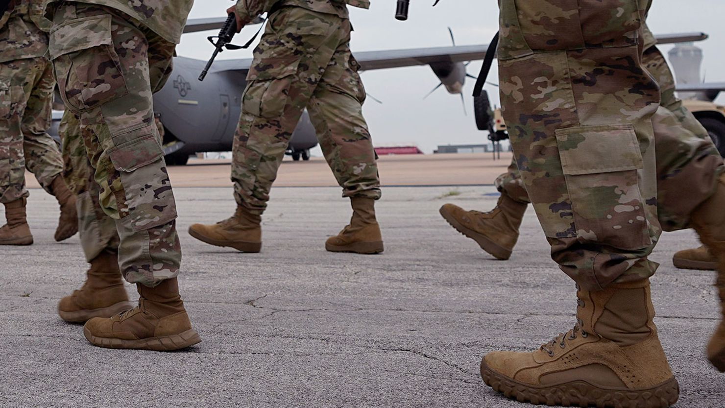 This file photo shows members of the Texas National Guard prepare to deploy to the Texas-Mexico border in Austin, Texas, on Monday, May 8.