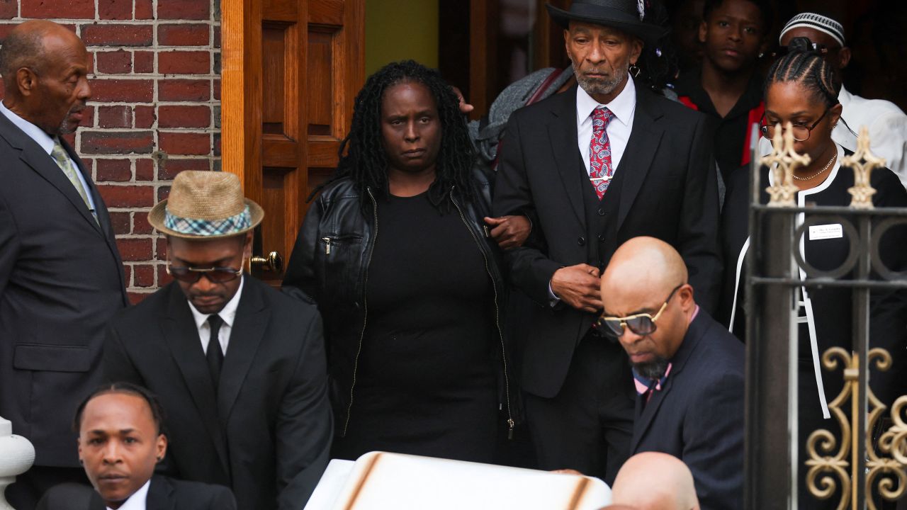 Andre Zachary, Jordan Neely's father, follows the coffin of his son after the funeral service Friday.