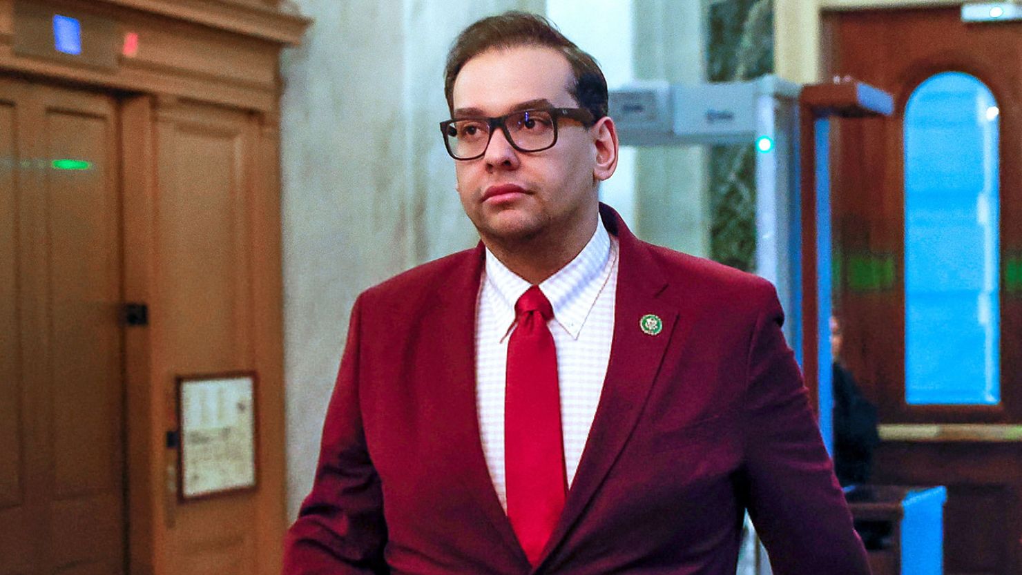 U.S. Rep. George Santos heads to the floor of the House of Representatives for a vote on a Republican motion to refer a Democratic-sponsored resolution to expel Santos from the House to the House Ethics Committee instead of an immediate explusion vote, on Capitol Hill in Washington.