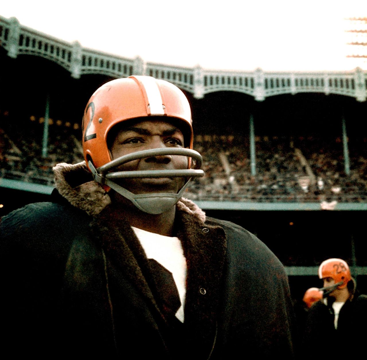 Brown is bundled up on the sidelines during an NFL game against the New York Giants in December 1964.