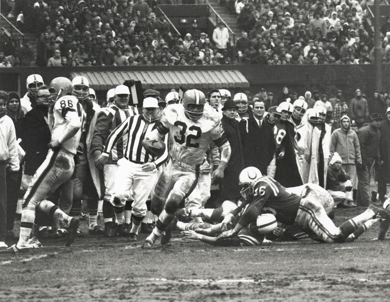 Brown rumbles down the sideline during the NFL Championship Game in December 1964. The Browns smashed the Baltimore Colts 27-0.