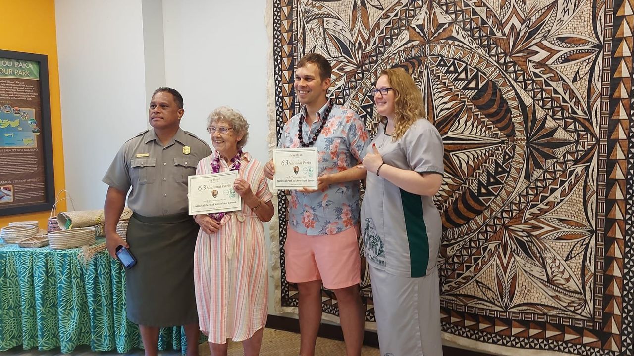 Brad Ryan and Joy Ryan, center, were honored on their visit to National Park of American Samoa.