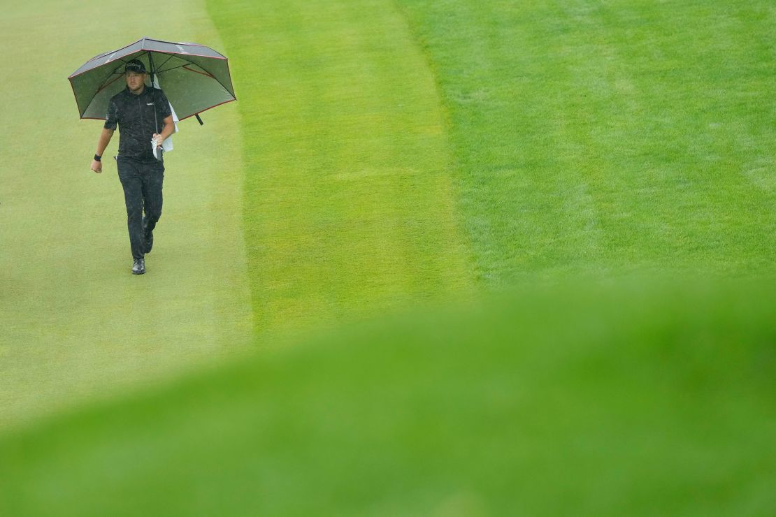 Hodges walks the 18th fairway during the third round.