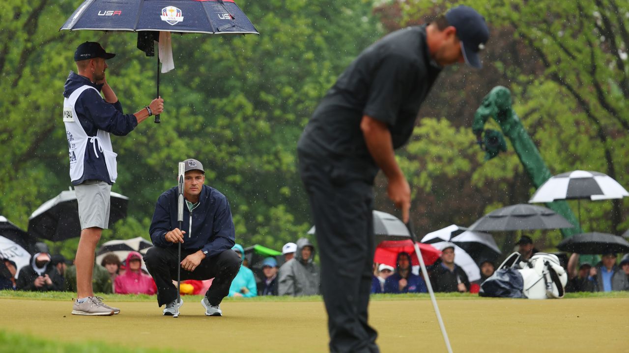 DeChambeau watches on at the PGA Championship in May.