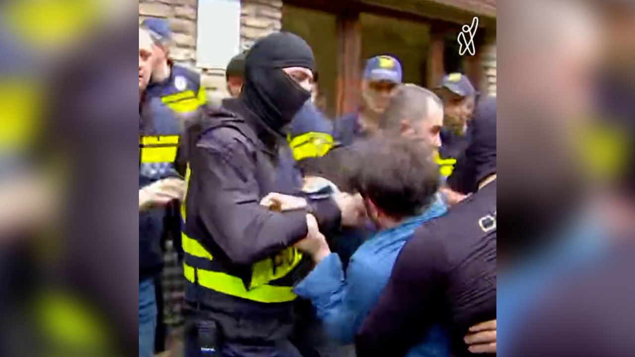 Police remove protesters outside the Kvareli Lake Hotel in Georgia on May 20.