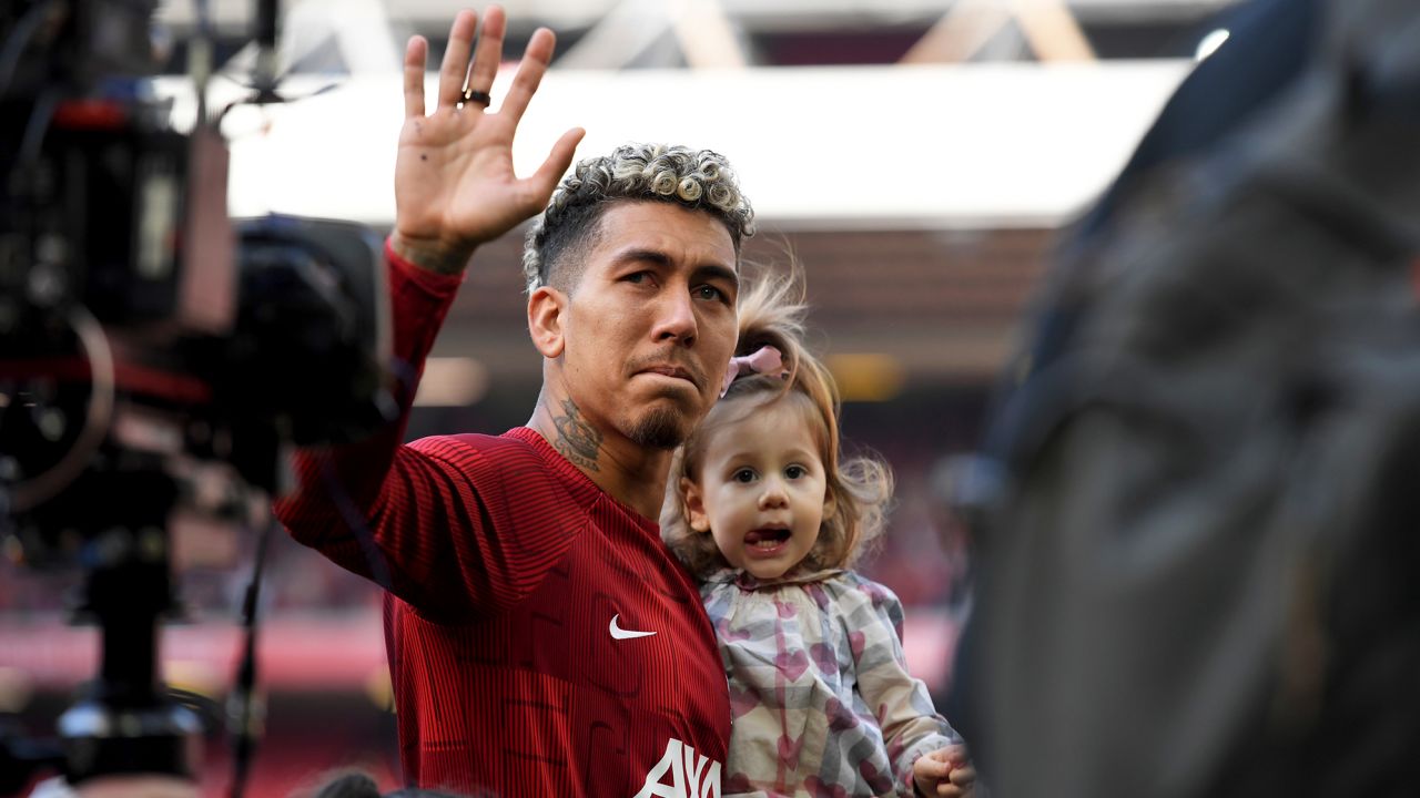 A tearful Roberto Firmino waves goodbye to the Kop End during his last match at Anfield. 