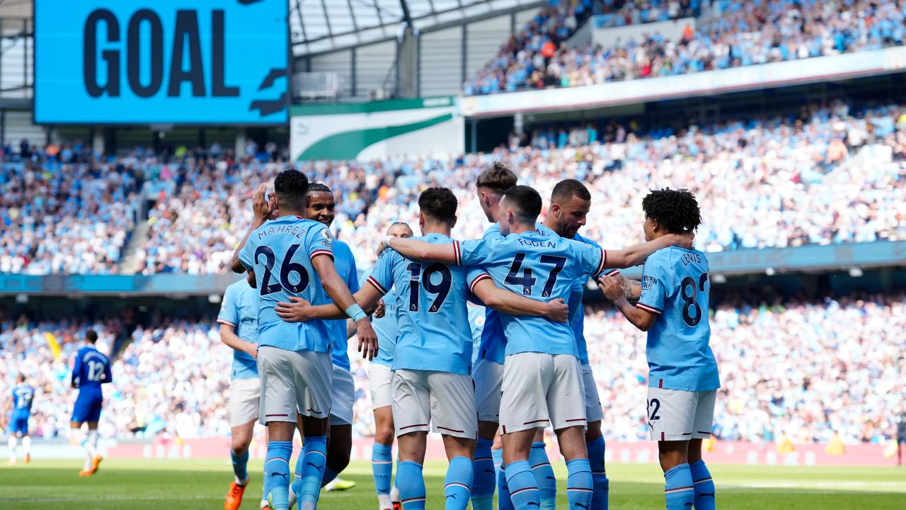 Manchester City's Julian Alvarez, centre, celebrates after scoring his side's winning goal against Chelsea. 