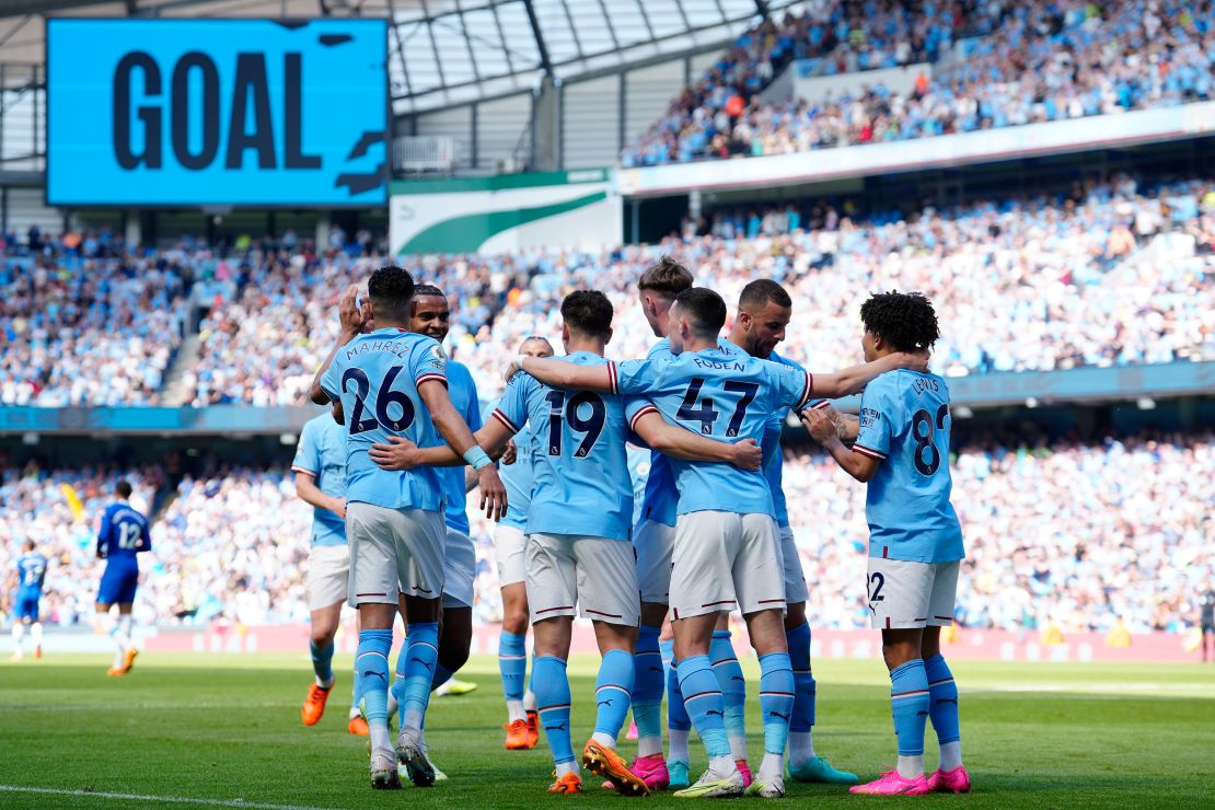 Manchester City's Julian Alvarez, centre, celebrates after scoring his side's winning goal against Chelsea. 