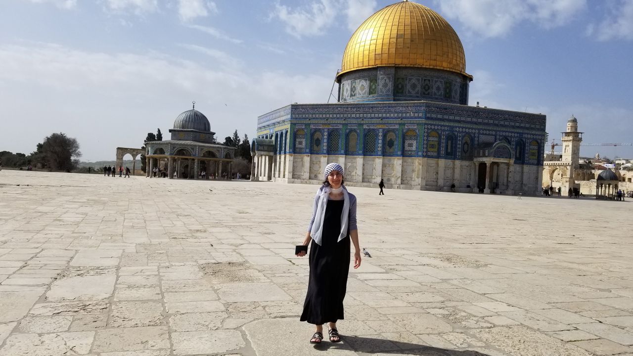 Ibtisam Barakat, author of "Tasting The Sky: A Palestinian Childhood," is shown in front of Al-Aqsa Mosque in Jerusalem.