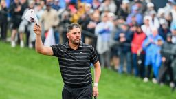 PGA Professional Michael Block tips his cap to fans on the 18th hole after carding a 70 during the third round of the 2023 PGA Championship at Oak Hill Country Club on May 20, 2023, in Rochester, New York. 