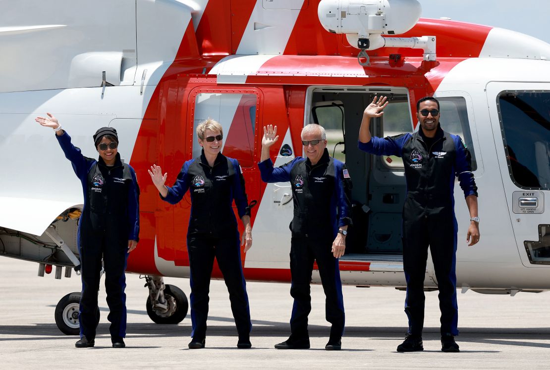 CAPE CANAVERAL, FLORIDA - MAY 21: (L-R) Saudi astronaut Rayyanah Barnawi, former NASA astronaut Peggy Whitson, investor and pilot John Shoffner, and Saudi astronaut Ali AlQarni wave before being brought to the SpaceX Falcon 9 rocket with the Crew Dragon spacecraft for launch from pad 39A at the Kennedy Space Center on May 21, 2023 in Cape Canaveral, Florida. The crew will be flying to the International Space Station to conduct science experiments. (Photo by Joe Raedle/Getty Images)