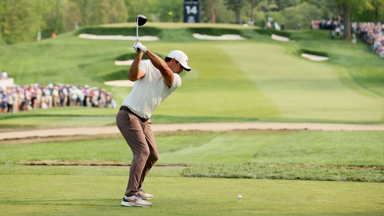 Koepka drives during the final round.
