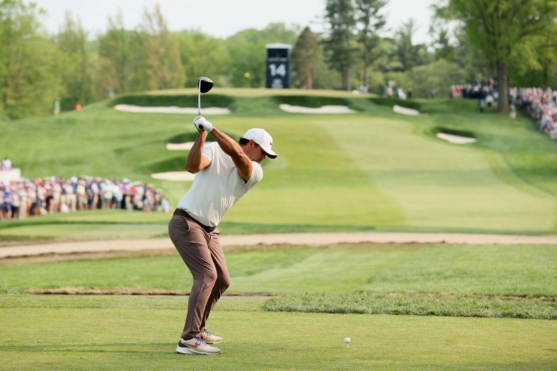 Koepka drives during the final round.