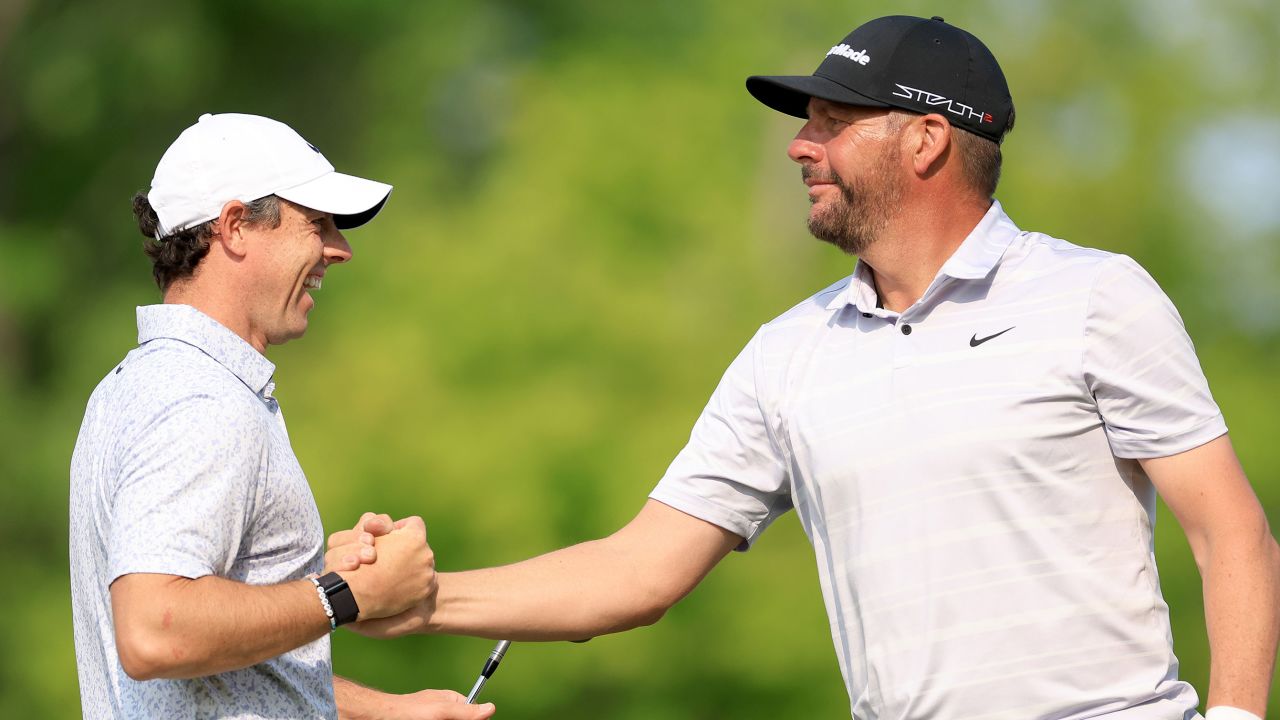 McIlroy congratulates Block on his ace.