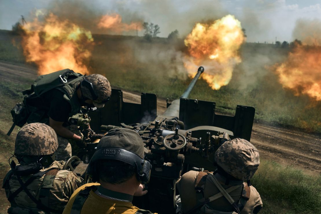 Ukrainian soldiers fire a cannon near Bakhmut on May 15, 2023. Kyiv rebuffed claims that Russian forces have captured the city in the eastern Donetsk region.