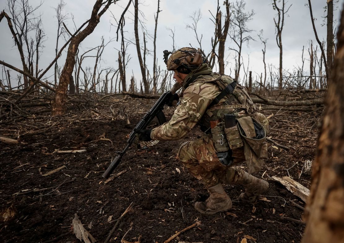 A Ukrainian serviceman checks Russian positions in Bakhmut on May 11, 2023. The city has been given an outsized importance by Moscow as it struggles to make gains in Ukraine.