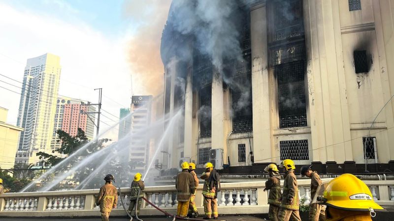 NextImg:Inferno tears through Manila's historic Central Post Office | CNN