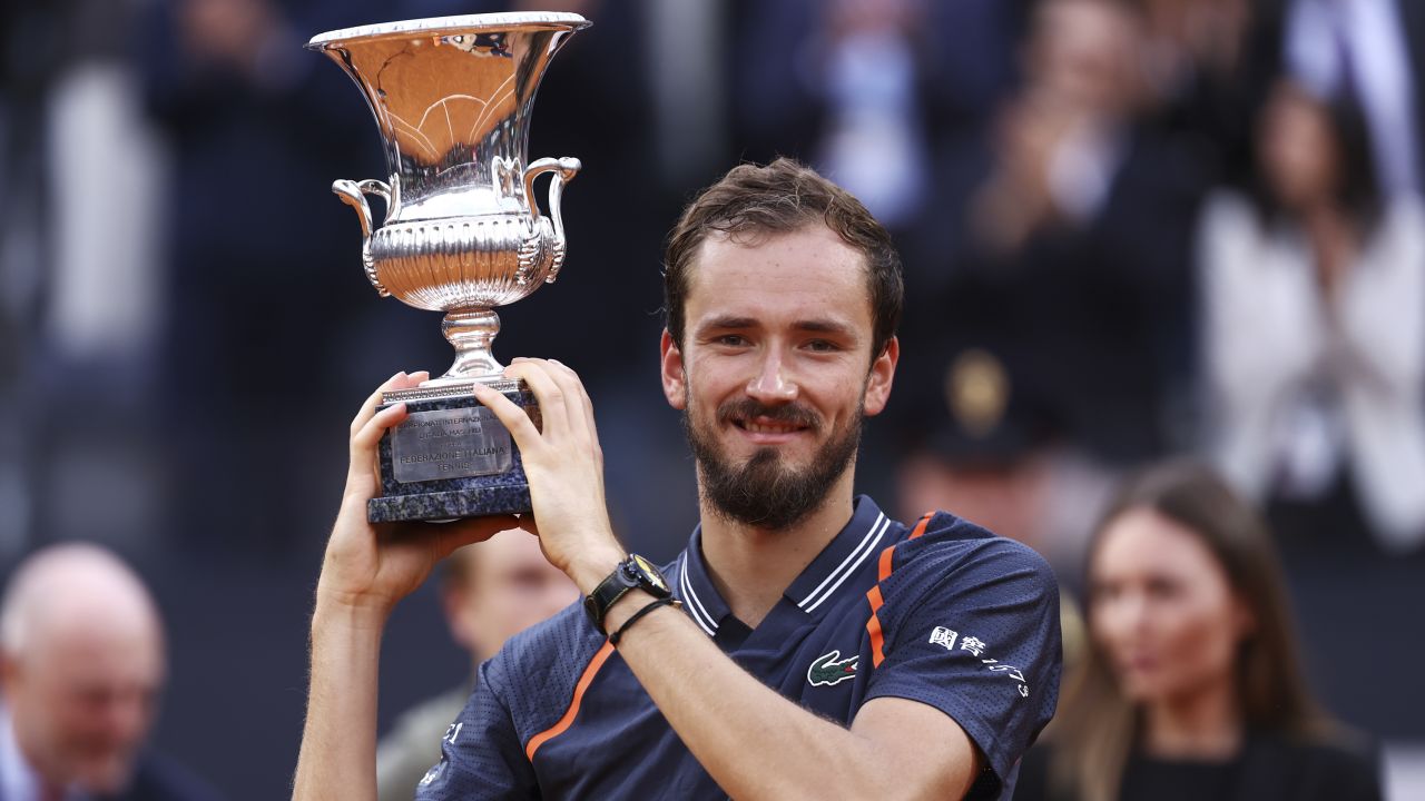 Medvedev lifts the Italian Open trophy after defeating Rune. 