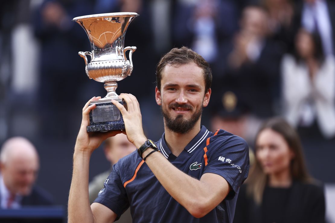 Medvedev lifts the Italian Open trophy after defeating Rune. 