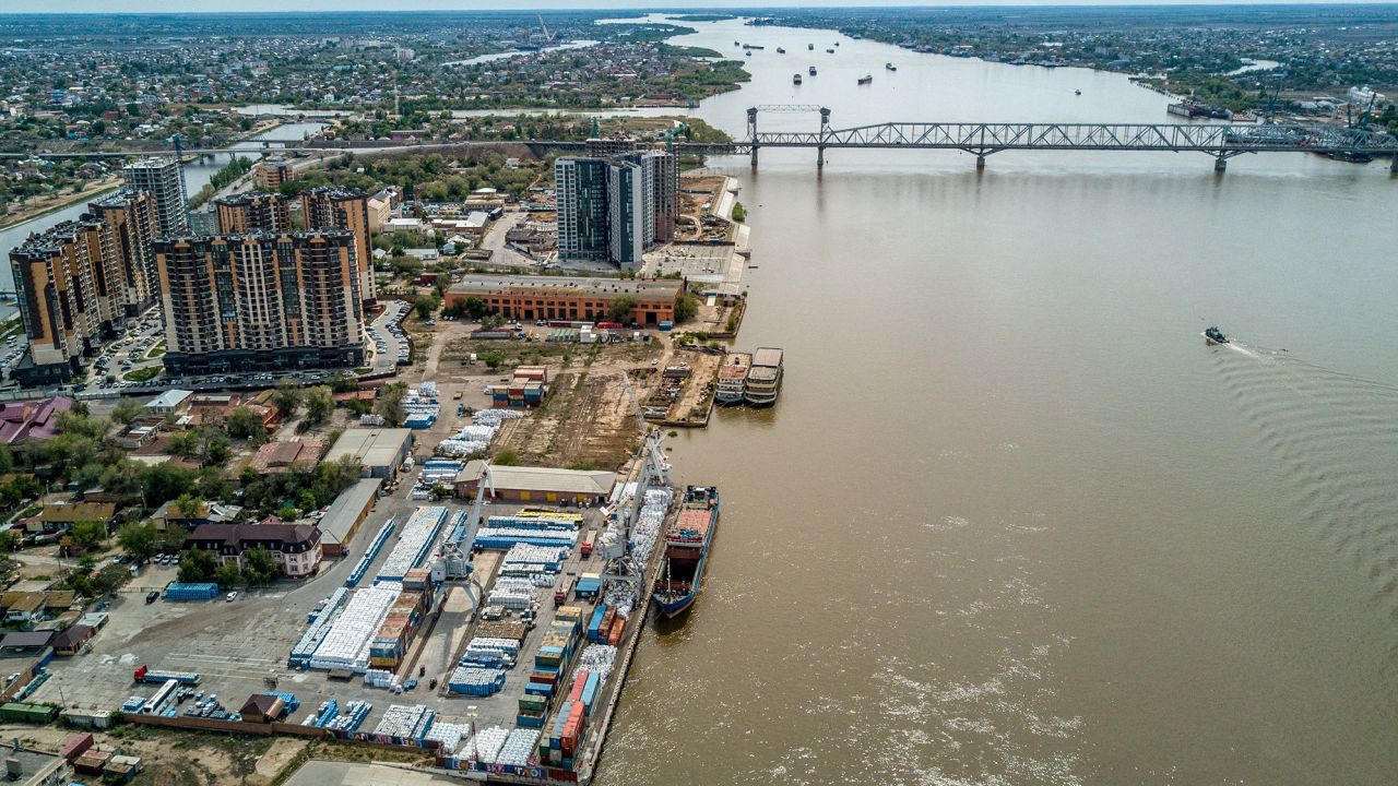 An aerial view taken on May 5, 2021 shows a railway bridge over the Volga river and a port in the city of Astrakhan. (Photo by Andrey BORODULIN / AFP) (Photo by ANDREY BORODULIN/AFP via Getty Images)