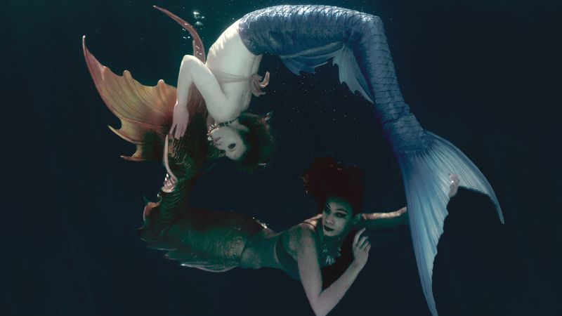 NextImg:'MerPeople' goes fins in with mermaid enthusiasts | CNN